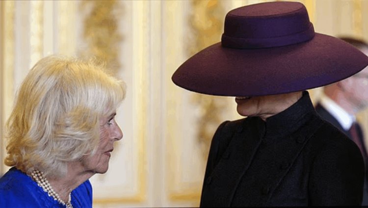 لماذا اخفت ميلانيا ترامب ملامحها في زيارة بريطانيا؟.. سر وراء القبعة البنفسجية